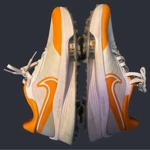 Women’s Nike golf cleats Orange and White